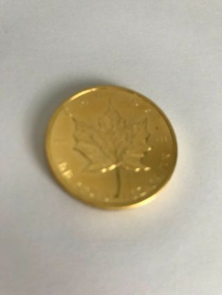 TWO COINS: 1981 1 - Oz Canadian Gold Maple Leaf $50 Coins.  999 Fine Gold 7