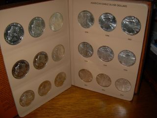 Silver Eagles 34 Uncirculated with book some with light hue 4