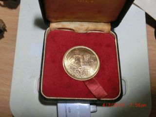 $150 Gold Coin issued to celebratel 150th Anniversary of Singapore ' s Founding 3