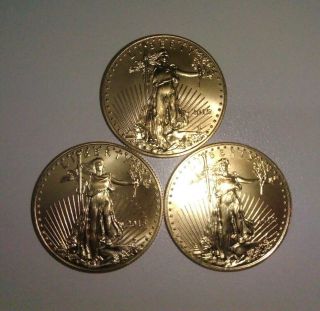 1 - 1/2 OUNCES.  24K AMERICAN GOLD EAGLES 2015 UNCIRCULATED 3 TOTAL @1/2 OUNCE EACH 3