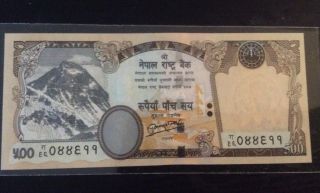 Scrace Nepal Rs 500 Mt.  Everest Back:two Tigers Sig.  19 P - 74.  Governor:yuva Raj