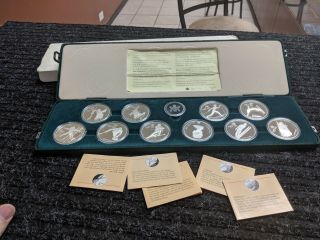 10 - Coin 999 Silver 1988 Calgary Olympic Games Coin Set Complete With Display Cas