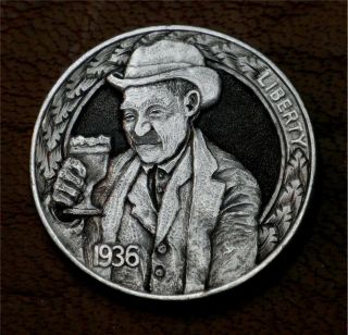 Hobo Nickel.  Hand Carved Howard Thomas.  This Drink Is On The House.