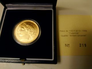 France 1988 Fraternity Coin 100 Francs - 1/2oz pure gold - Mintage 3,  000 - spot 2