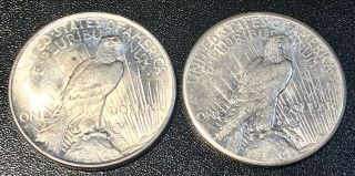 2 Peace Silver Dollars 1922,  1927 2