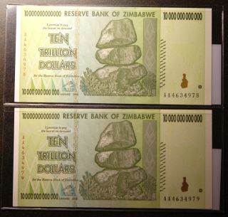 2 Consecutive 10 Trillion Dollar Zimbabwe Notes.  In Holders