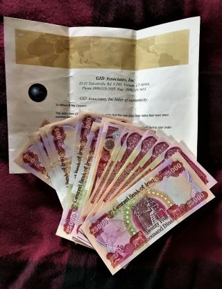 300,  000 Iraqi Dinar Uncirculated - - - (12).  25,  000 Notes