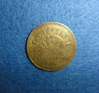 East Oakland,  Calif.  Trade Token - - The Yosemite Saloon,  516 23rd Ave.  5c Drink.