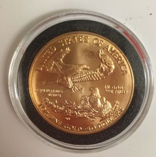 1999 American Eagle 1 oz Gold Coin 1 oz.  fine gold $50 bullion proof uncirclated 4