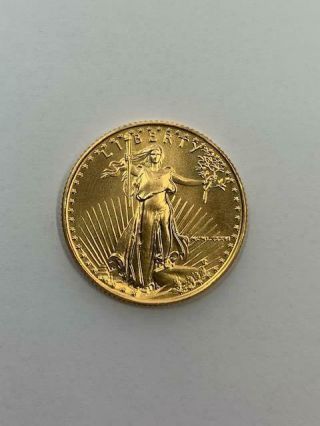1986 $10 Gold Eagle.  1/4 Oz.  First Year Of Issue.  Uncertified.  Nr.