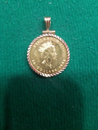 1991 $10 Canadian Maple Leaf 1/4 Oz Pure Gold.  9999 In Necklace Casing