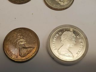 (6) Canada Silver Dollars (2) 1971,  1972,  1973,  1975,  1986 7