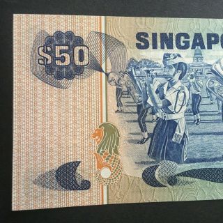1976 SINGAPORE 50 DOLLARS A/2 128631 P - 13a UNC WHITE RUMPED SHAMA SCHOOL BAND 6