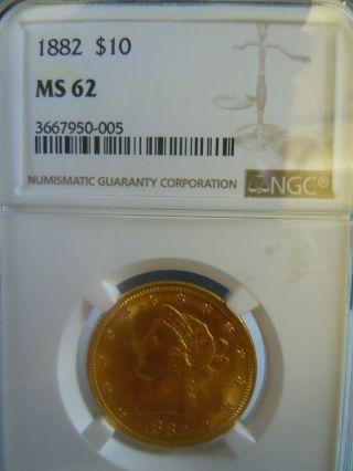 1882 $10.  00 Liberty Gold Eagle,  1/2 Oz. ,  Ms62