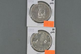 Two - Canadian Silver Dollars - 1957 Bu 1958 Au