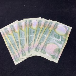 100,  000 (10 x 10,  000) Iraq Dinar - Group of 10 lightly circulated notes 2