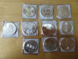 10 Different Silver Ounce Coins,  Mostly Foreign,  Just One Usa,