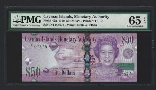 2010 Cayman Islands $50 Dollars,  A/1 000574 S/n,  P - 42a,  Pmg 65 Epq Gem Unc,  Qeii