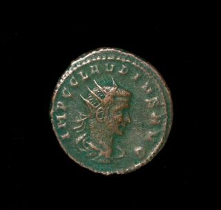 A Roman Bronze Coin Of Emperor Claudius