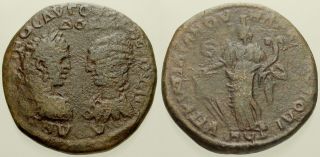 034.  Roman Bronze Coin.  Caracalla & Julia Domna,  Ae - 27.  Moesia.  Tyche