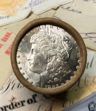 (one) Uncirculated $10 Silver Dollar Roll 1885 And 1879 Morgan Dollar Ends