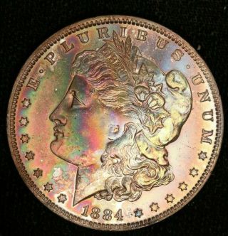 1884 - O $1 Morgan - Stunning Rainbow - Toned Obv