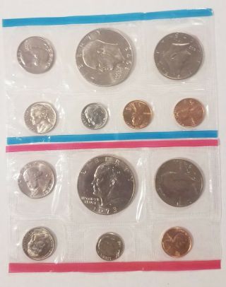 1973 P & D Us Set With 2 Ike Dollars And 2 Kennedy Half Dollars