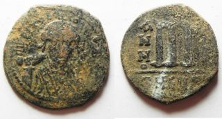 Zurqieh - Aa8394 - Byzantine.  Maurice Tiberius Ae Follis