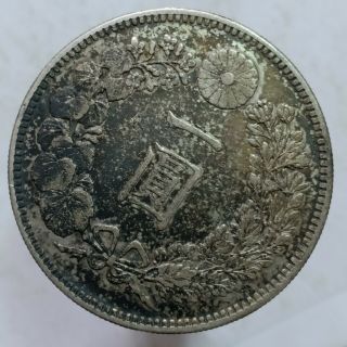 Japan 1 yen.  900 silver coin 1895 meiji 28 sharp details toned 7