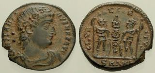 047.  Roman Bronze Coin.  Constantine I.  Ae - Follis.  Antioch.  Soldiers.  Vf