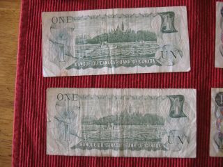 5 Canadian one dollar bills 1973 & 1 1986 two dollar,  circulated 3