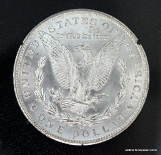 GSA Hoard 1883 - CC Morgan Silver Dollar graded State 62 by ANACS 2