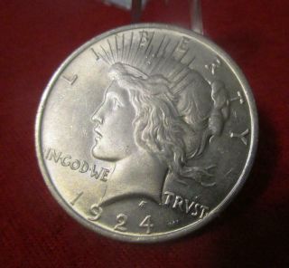 1924 Silver Peace Dollar.  Uncirculated  Mf - 3121