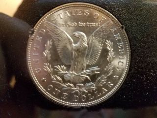 1883 - CC Morgan Silver dollar,  GSA Hoard,  Uc,  w/ ON 4