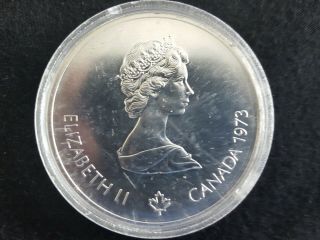 1973 Canada 10 Dollar Silver 1976 Montreal Olympic Games Silver Coin In Plastic.