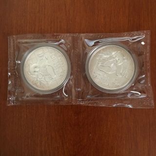 Two (2) 1989 Chinese Panda 1 Oz Silver Coins.  999 Double