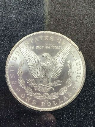 1883 CC Uncirculated Morgan Silver Dollar with packaging.  BU 2