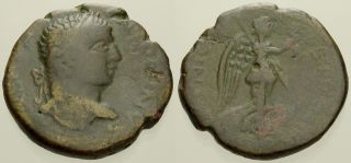 046.  Roman Bronze Coin.  Caracalla.  Ae - 22.  Stobi,  Macedonia.  Nike.  Avf