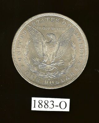 MORGAN SILVER DOLLAR: 1883 - O (Estimated Grade: a AU) 2
