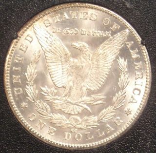 1883 - CC Morgan Silver Dollar $1 Coin in GSA Holder - NGC MS63 - Rainbow Tone 9