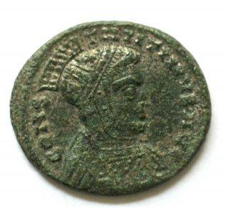 Constantine I Æ Ad 319.  Helmeted,  Laureate And Cuirassed Bust Right / Victoriae