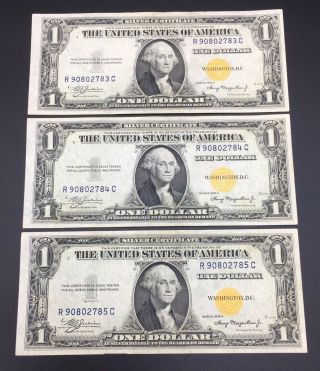 (3) Three Consecutive 1935 One Dollar Gold Seal Silver Certificates Uncirculated