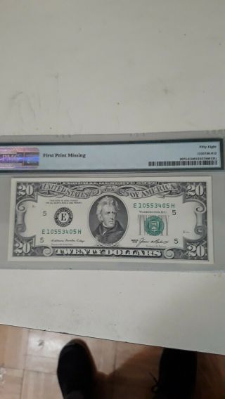 United States 1985 $20 error note missing first printing PMG 58. 2
