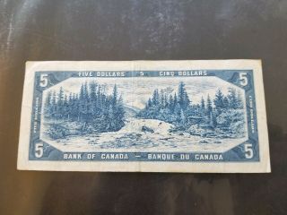 1954 CANADIAN 5 DOLLAR BILL.  Low serial number (CIRCULATED) 2