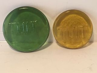 Unique - Two Vintage Glass Round Tuit.  Green = 2 " Dia.  Yellow = 1 3/4 " Dia.