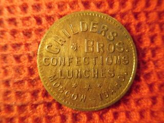 Moscow,  Idaho Brass Confectionery And Lunches Trade Token