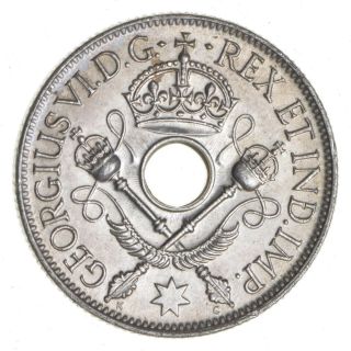 Roughly Size Of Quarter - 1945 Guinea 1 Shilling - World Silver 5.  4g 502