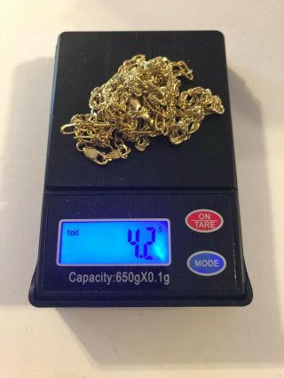 4.  2 Grams 10kt Yellow Gold Scrap