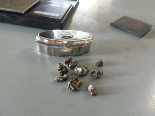 GOLD NUGGETS 9,  grams and small metal box.  Low purity. 4