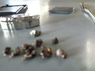 GOLD NUGGETS 9,  grams and small metal box.  Low purity. 5